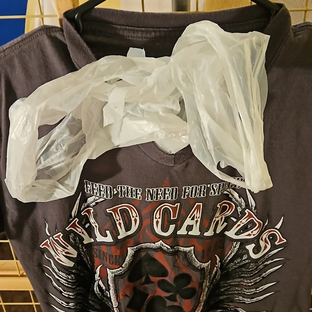From moms closet This is a shirt sewed up to store plastic bags or anything else